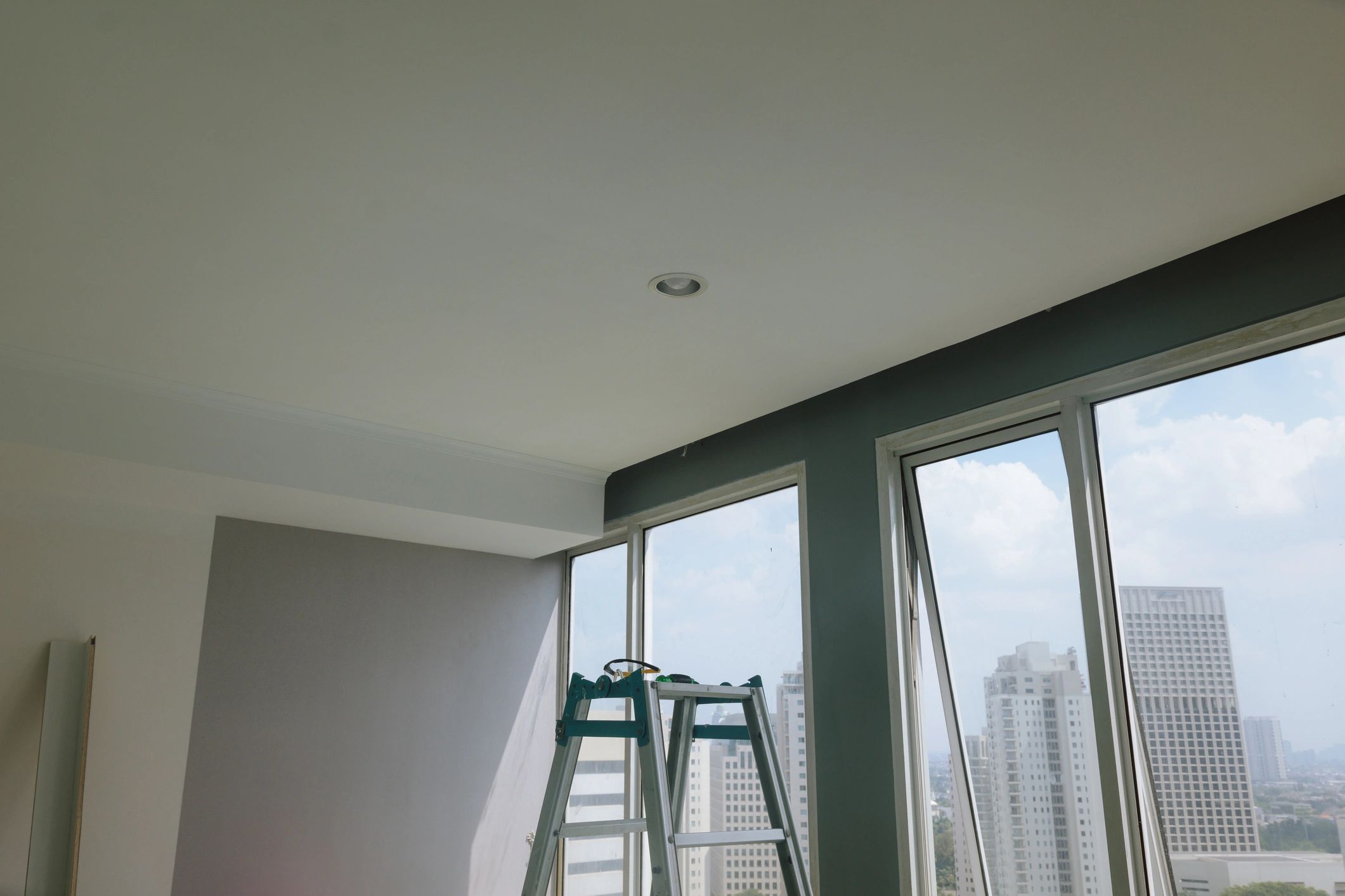 Renovated apartment interior with ladder