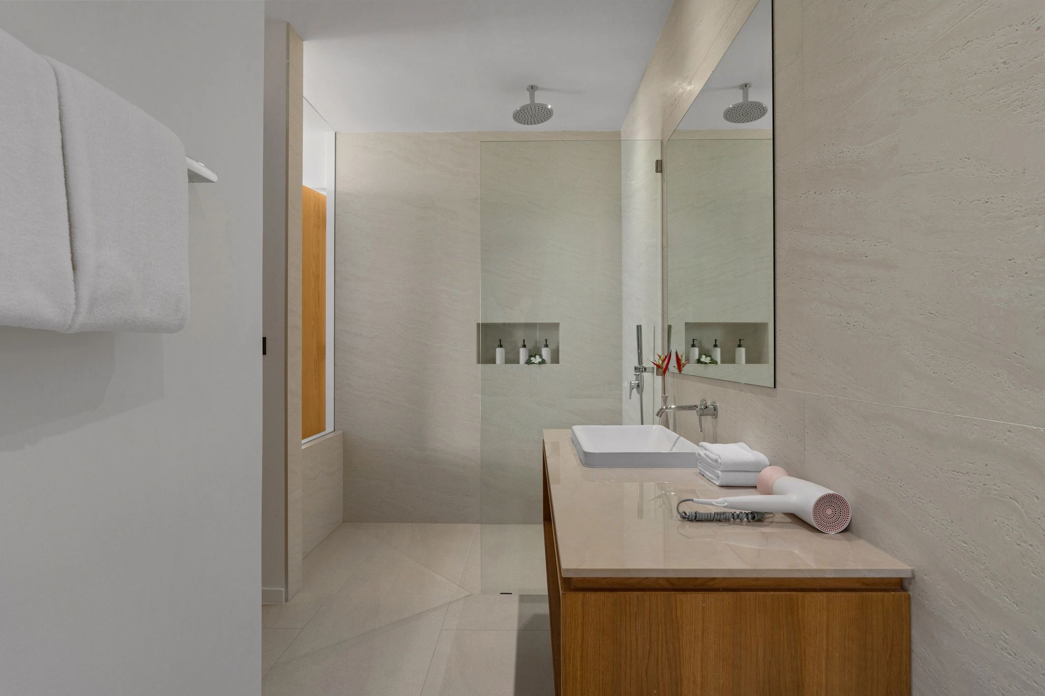 Minimalist bathroom with wooden vanity